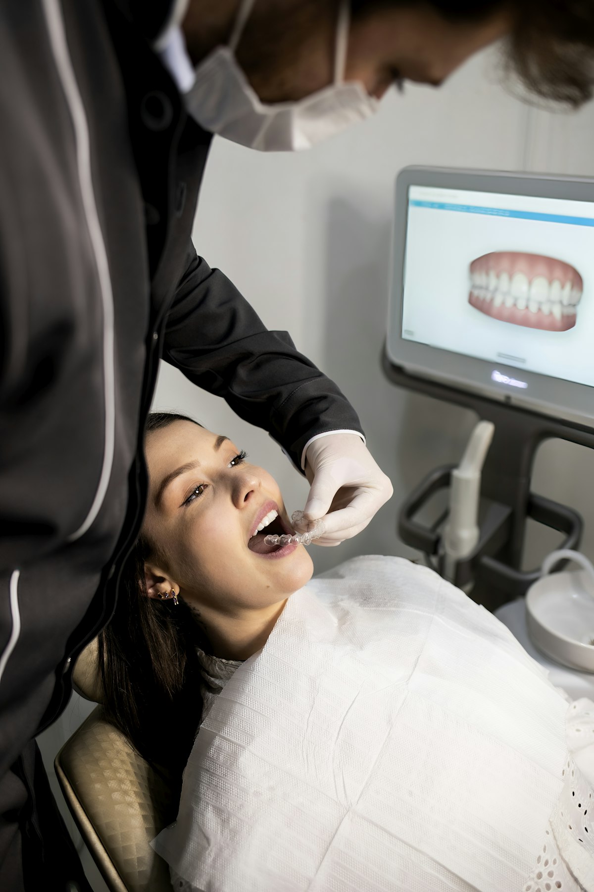 A smiling patient in the dental chair